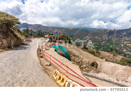 road repair for cars in a mountain area 97795013