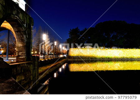 Imperial Palace in the middle of winter Wadakura Bridge over the Wadakura moat beautifully lit up at night 97795079