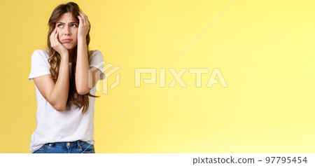 Shocked timid insecure young panicking woman wanna cry standing anxious frightened grab head both hands freak out look away praying for help terrified stand yellow background horrified Shocked timid insecure young panicking woman wanna cry standing anxious frightened grab head both hands freak out look away praying for help terrified stand yellow background horrified 97795454