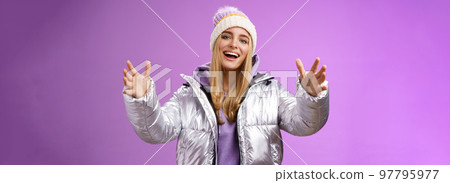 Charming carefree gorgeous blond european girl holding big thing explaining shape box extend arms reaching camera wanna hold friend tight cuddle embrace smiling friendly satisfied, purple background Charming carefree gorgeous blond european girl holding big thing explaining shape box extend arms reaching camera wanna hold friend tight cuddle embrace smiling friendly satisfied, purple background 97795977