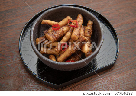 Edible wild burdock marinated in soy sauce 97796188