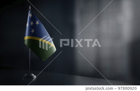 Small national flag of the Solomon on a black background 97800920