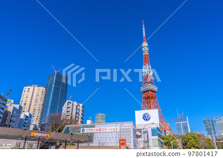 Tokyo cityscape in Japan View of Tokyo Tower and Toranomon-Azabudai Project shining in the blue sky from the intersection of Akabanebashi 97801417