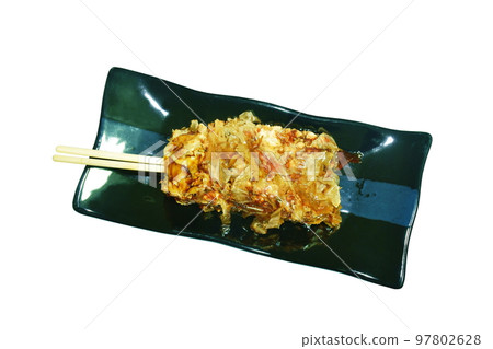 Okonomiyaki or Japanese pizza grilled roll in wooden stick  topping mashed salmon and seaweed  dressing mayonnaise roll on plate  97802628
