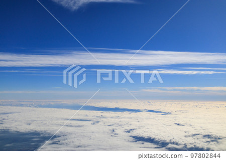 Winter clouds seen from an airplane 97802844