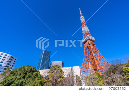 Tokyo cityscape in Japan Looking at Tokyo Tower and Toranomon / Azabudai project shining in the blue sky = December 29 97803262