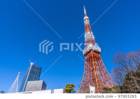 Tokyo cityscape in Japan Looking at Tokyo Tower and Toranomon / Azabudai project shining in the blue sky = December 29 97803265