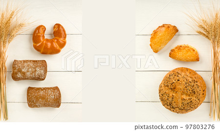 Bread , sweet pastry and ears of wheat on white background. View from above. Free space for text. Bread , sweet pastry and ears of wheat on white background. View from above. Free space for text. 97803276