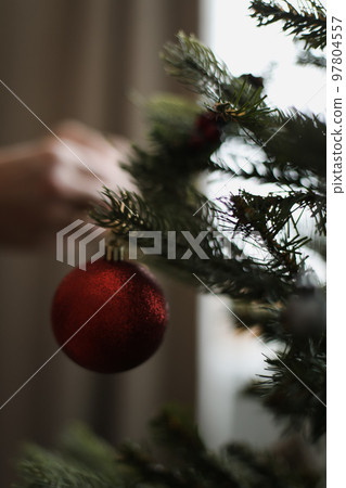 Christmas composition. New Year background. Christmas decoration hanging on tree Christmas composition. New Year background. Christmas decoration hanging on tree 97804557