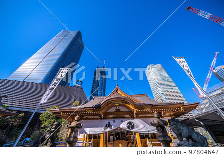The cityscape of Tokyo in Japan, with views of the skyscrapers of the Toranomon-Azabudai project and Hachiman Shrine The cityscape of Tokyo in Japan, with views of the skyscrapers of the Toranomon-Azabudai project and Hachiman Shrine 97804642