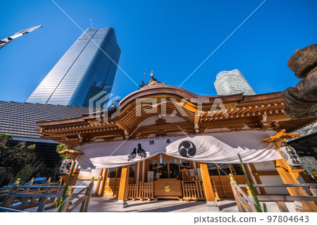 The cityscape of Tokyo in Japan, with views of the skyscrapers of the Toranomon-Azabudai project and Hachiman Shrine The cityscape of Tokyo in Japan, with views of the skyscrapers of the Toranomon-Azabudai project and Hachiman Shrine 97804643