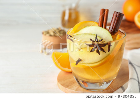 Aromatic white mulled wine on table. Space for text 97804853