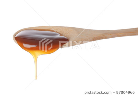 Salted caramel in spoon isolated on white 97804966