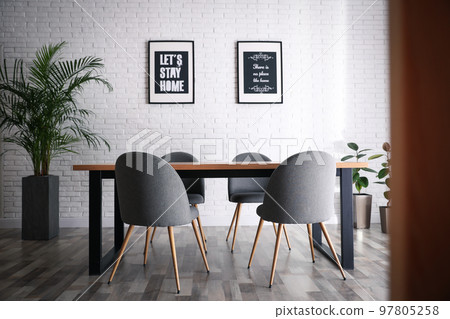Modern dining room interior with stylish furniture Modern dining room interior with stylish furniture 97805258
