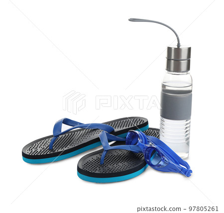Swimming goggles, water bottle and flip flops isolated on white Swimming goggles, water bottle and flip flops isolated on white 97805261