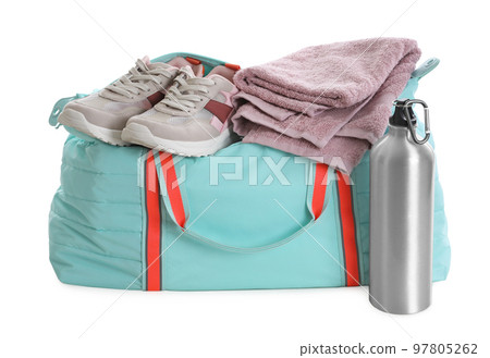Sports bag with gym equipment on white background 97805262