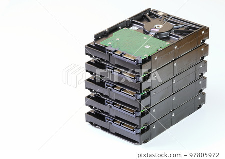 pile or stack of HDD, SSHD Hybrid hard disk drives 3.5" standard profile show on SATA interface, isolated on white background 97805972