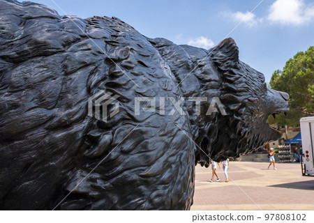Los Angeles, USA. September 20, 2022. Close-up of black bronze sculpture of Bruin at UCLA campus with blue sky in the background Los Angeles, USA. September 20, 2022. Close-up of black bronze sculpture of Bruin at UCLA campus with blue sky in the background 97808102