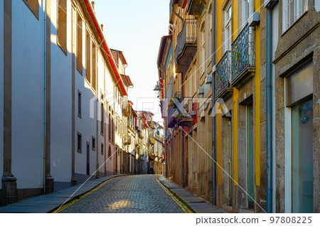 Evening sun narrow street Porto Evening sun narrow street Porto 97808225