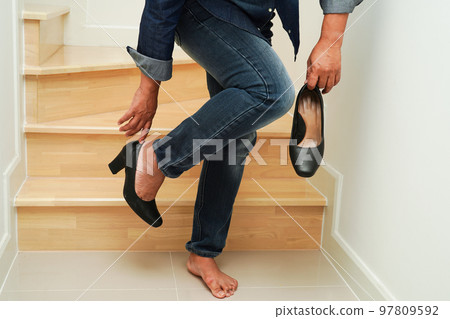 Asian business woman pain ankle, foot with leg cramp and fall down the stairs because slippery surfaces in office. Asian business woman pain ankle, foot with leg cramp and fall down the stairs because slippery surfaces in office. 97809592