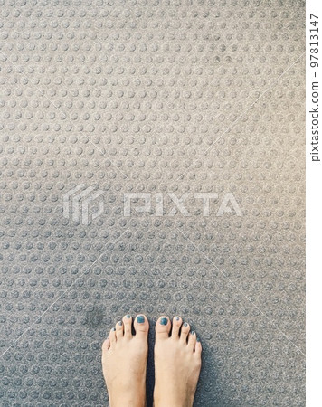 bare feet with blue nails 97813147