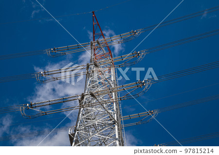 High voltage transmission tower in the blue sky High voltage transmission tower in the blue sky 97815214