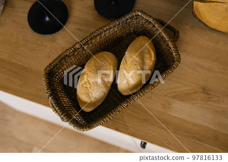 Bread in the basket. a loaf in the kitchen, homemade cakes. delicious flour products 97816133