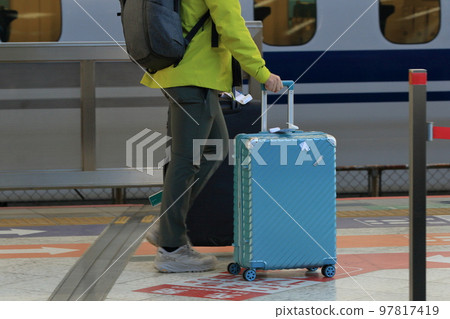 Shinkansen platform passenger, tourist, businessman Shinkansen platform passenger, tourist, businessman 97817419