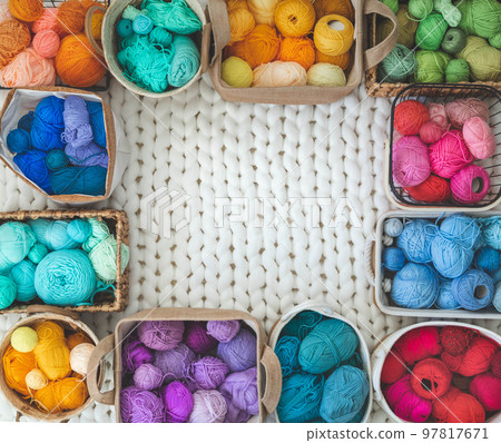 Many baskets made of natural eco-friendly materials. Multicolor yarn for knitting, knitting needles Many baskets made of natural eco-friendly materials. Multicolor yarn for knitting, knitting needles 97817671