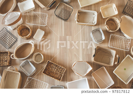 Flat lay of storage boxes; containers and baskets with different sizes and shapes 97817812