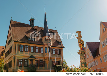 Old national German town house in Bietigheim-Bissingen, Baden-Wuerttemberg, Germany, Europe. Old Town is full of colorful and well preserved buildings. Old national German town house in Bietigheim-Bissingen, Baden-Wuerttemberg, Germany, Europe. Old Town is full of colorful and well preserved buildings. 97818092