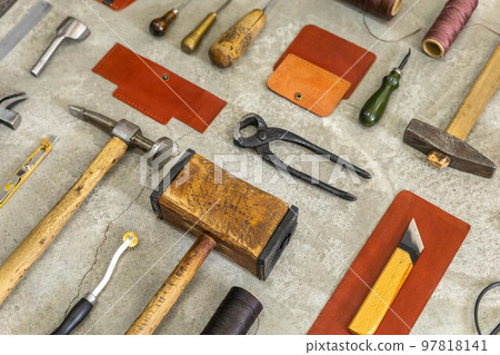 Top view materials and instruments on cutting mat for chopping measurement leatherwork details Top view materials and instruments on cutting mat for chopping measurement leatherwork details 97818141
