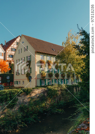 Old national German town house in Bietigheim-Bissingen, Baden-Wuerttemberg, Germany, Europe. Old Town is full of colorful and well preserved buildings. Old national German town house in Bietigheim-Bissingen, Baden-Wuerttemberg, Germany, Europe. Old Town is full of colorful and well preserved buildings. 97818286