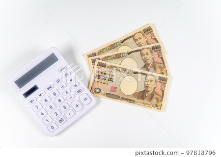 Calculator and three 10,000 yen bills Calculator and three 10,000 yen bills 97818796