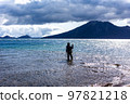 Fisherman of Lake Shikotsu, a national park in Hokkaido, Japan 97821218