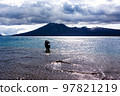 Fisherman of Lake Shikotsu, a national park in Hokkaido, Japan 97821219