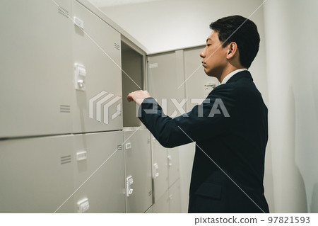 Office workers in lockers and suits Office workers in lockers and suits 97821593