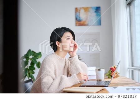 Young female creator working in the office 97821817