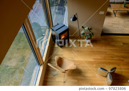 Room with pellet stove and wood stove 97823806