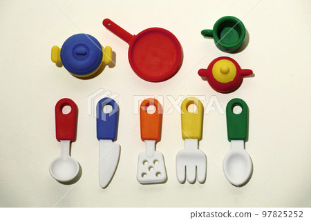 Bird's-eye view of colorful cookware miniatures 97825252