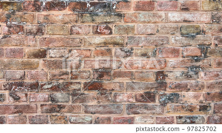 Red brick wall. Stone weathered texture background Red brick wall. Stone weathered texture background 97825702