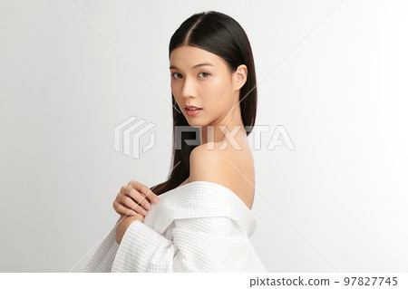 Beautiful young asian woman with clean fresh skin on white background, Face care, Facial treatment, Cosmetology, beauty and spa, Asian women portrait. Beautiful young asian woman with clean fresh skin on white background, Face care, Facial treatment, Cosmetology, beauty and spa, Asian women portrait. 97827745