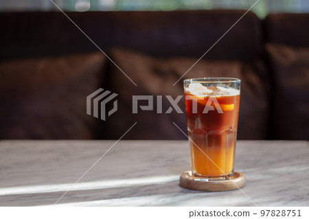 Glass of americano mixed with orange juice 97828751