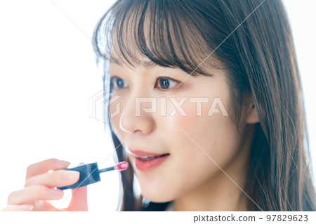 A woman wearing a lipstick A woman wearing a lipstick 97829623