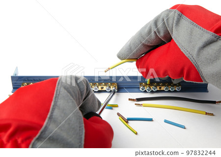 Installation electrical wire with terminal block. Electrician in Installation electrical wire with terminal block. Electrician in 97832244