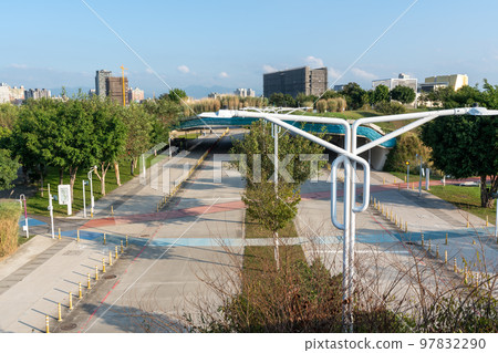 Taichung City, Taiwan - November 28, 2022 : Taichung Central Park Sidewalk and Bridge. Xitun District Shuinan Economic and Trade Area. 97832290