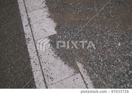 Parking lot gravel pops out onto the road Parking lot gravel pops out onto the road 97833726