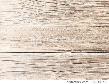木板牆表面的背景圖像,上面覆蓋著白褐色的老木頭,已經風化,木紋很深 木板牆表面的背景圖像,上面覆蓋著白褐色的老木頭,已經風化,木紋很深 97834146