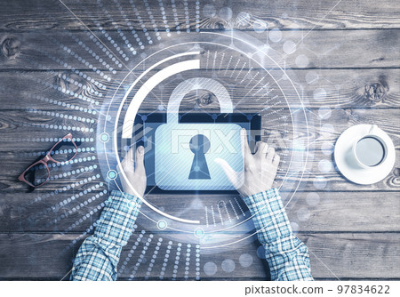 Concept of computer access with media lock icon on tablet screen Concept of computer access with media lock icon on tablet screen 97834622