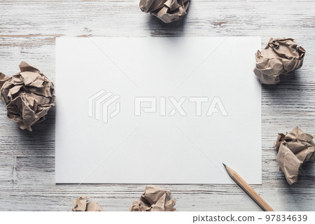 Concept of creativity and inspiration presented by blank papershit. Place your text 97834639